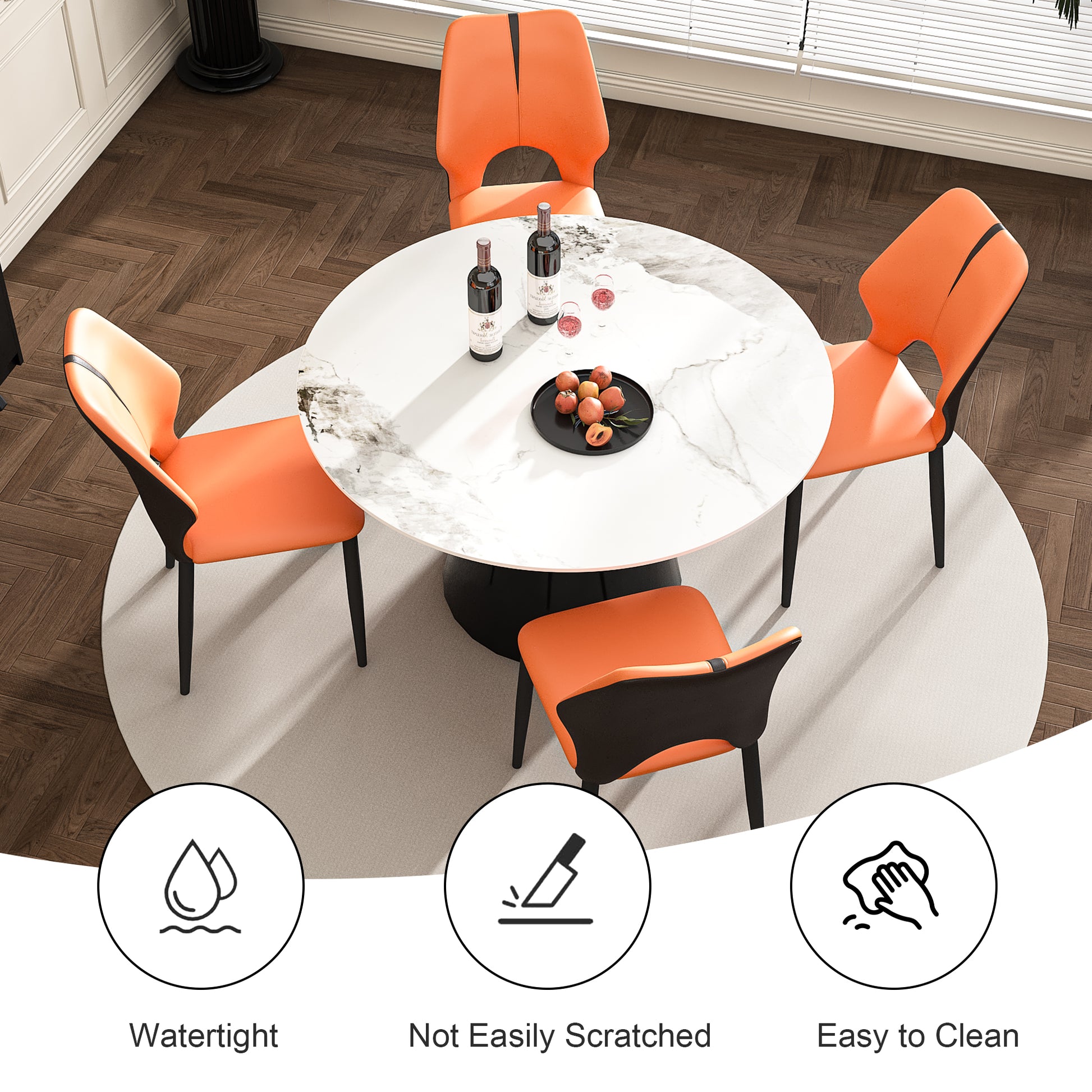 Modern dining set with four orange upholstered chairs and a white marblelook round table