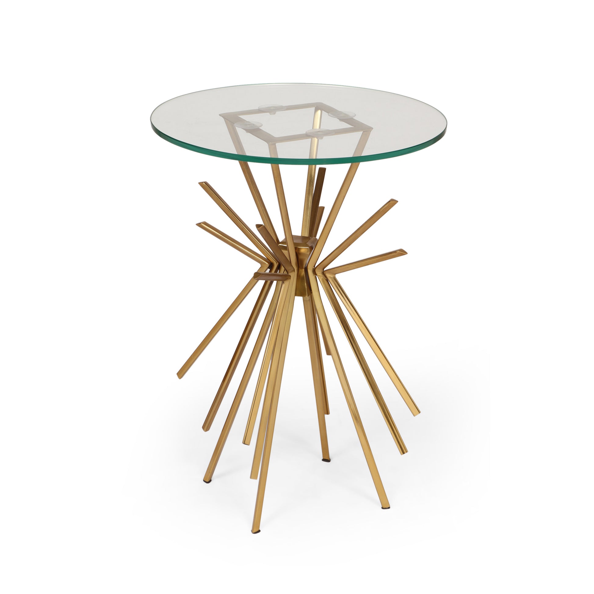 Round glass top accent table with a gold starburst base