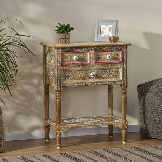 Wooden accent cabinet with three drawers and intricate white detailing