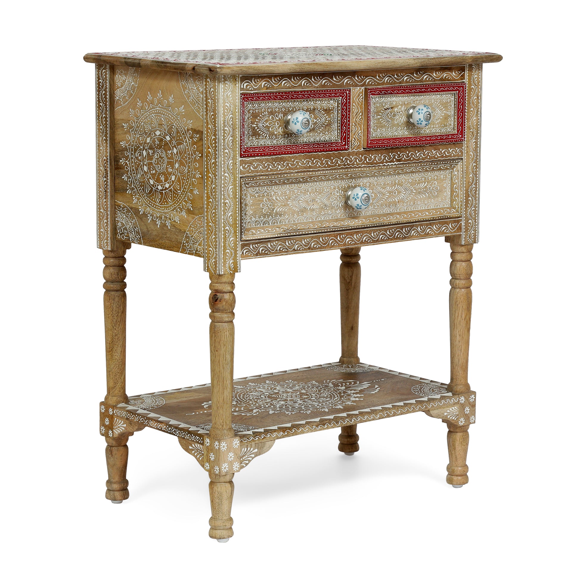 Ornate wooden side table with white mandala carvings and red accents