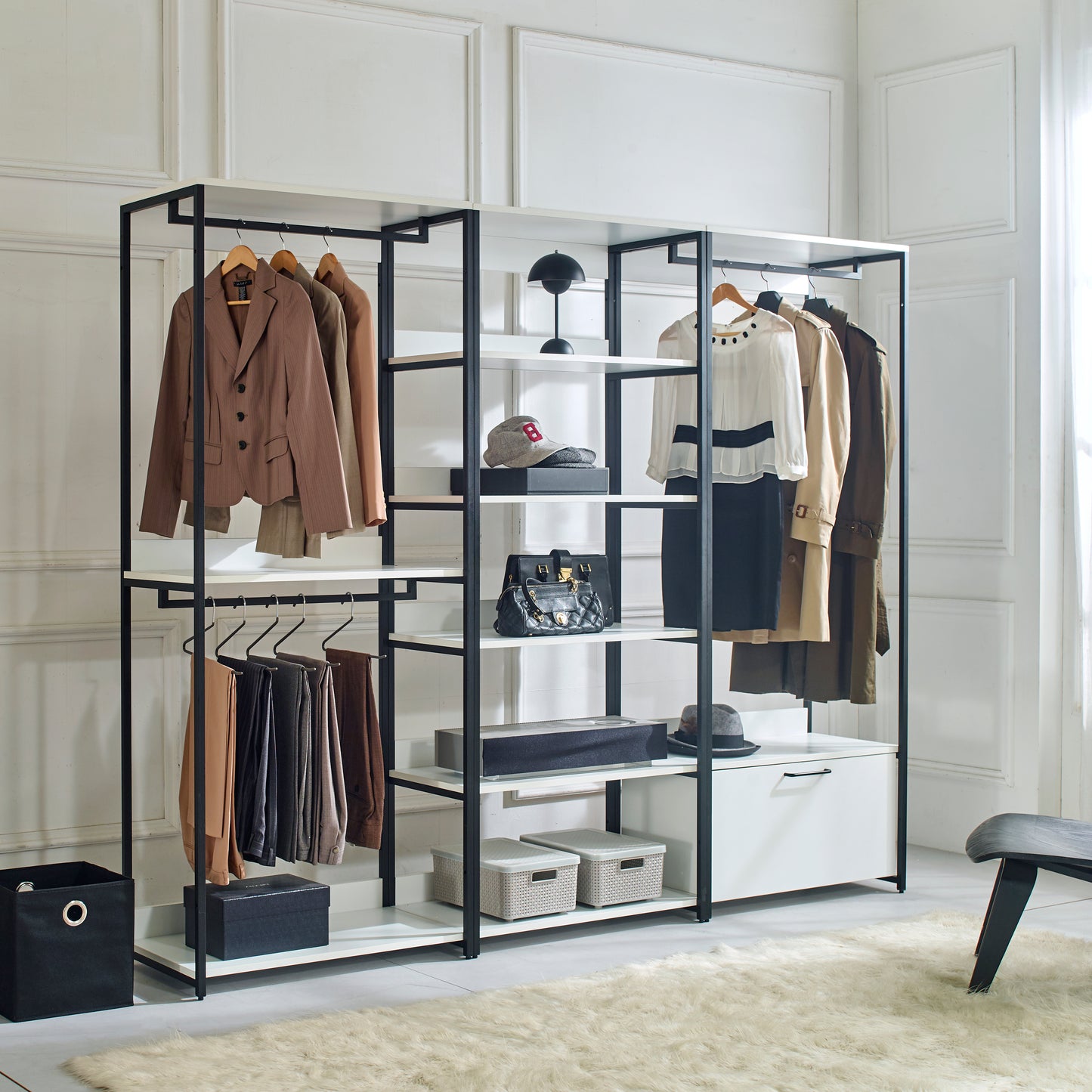Brown pinstripe blazer hanging on an open wardrobe rack