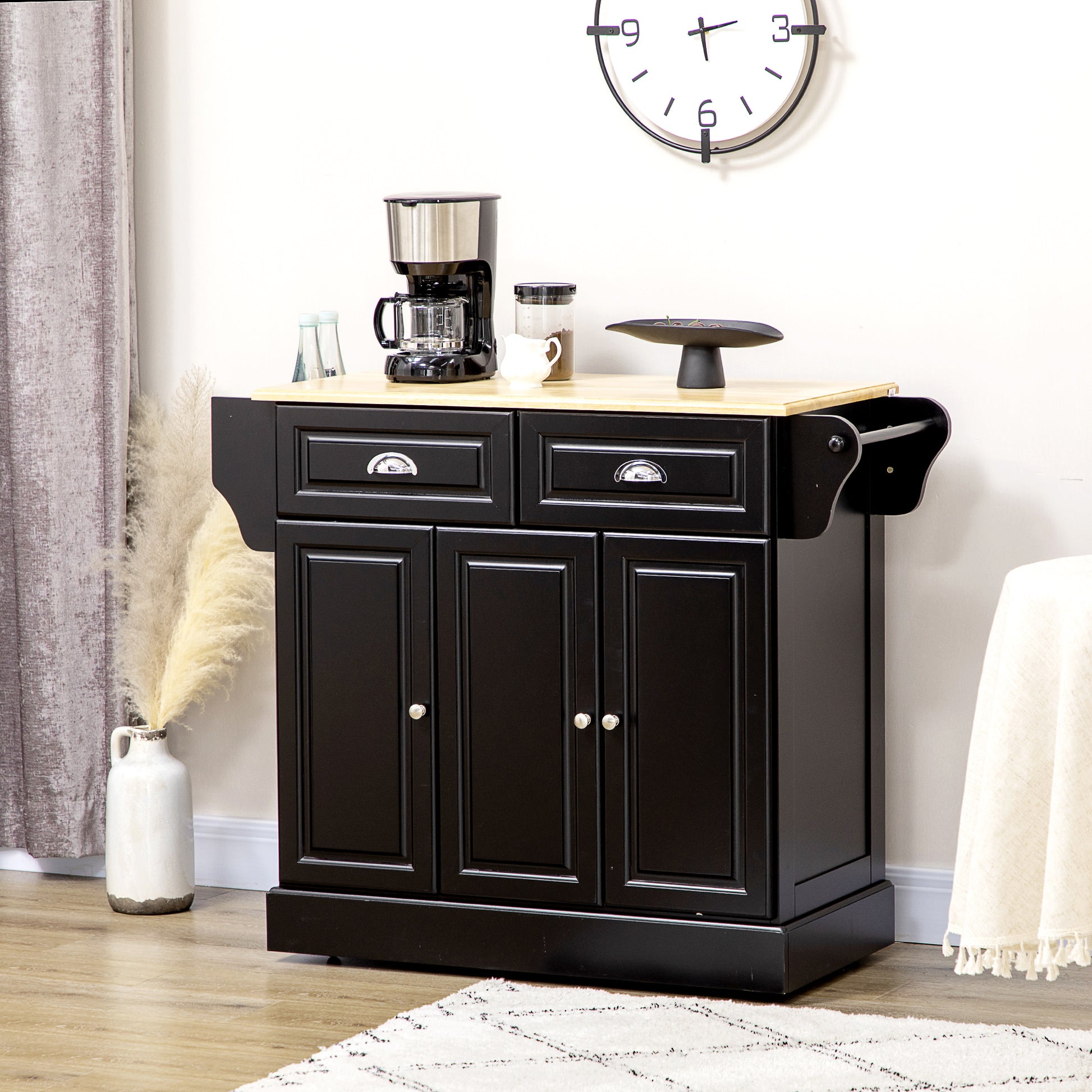 Black kitchen island with natural wood top