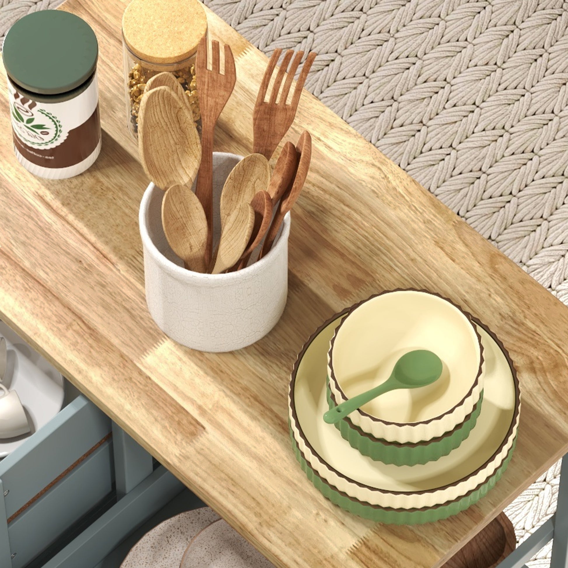 Wooden salad servers and spoons in a white ceramic holder