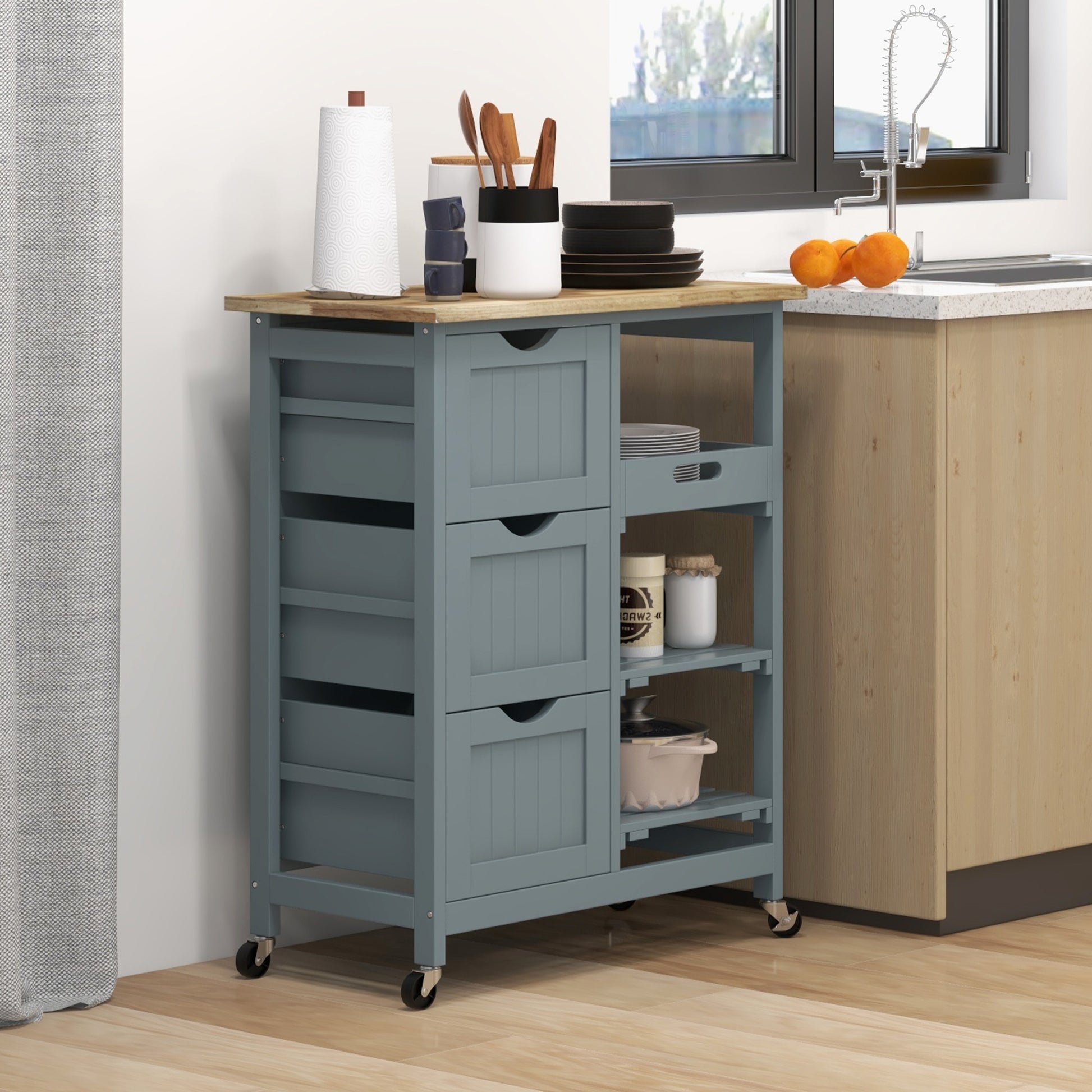 Grey kitchen cart with wooden top and drawers