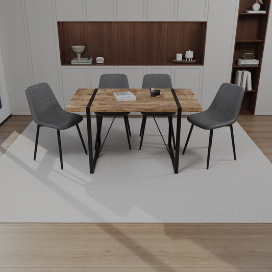 Rustic wooden dining table with black metal legs and four grey upholstered chairs