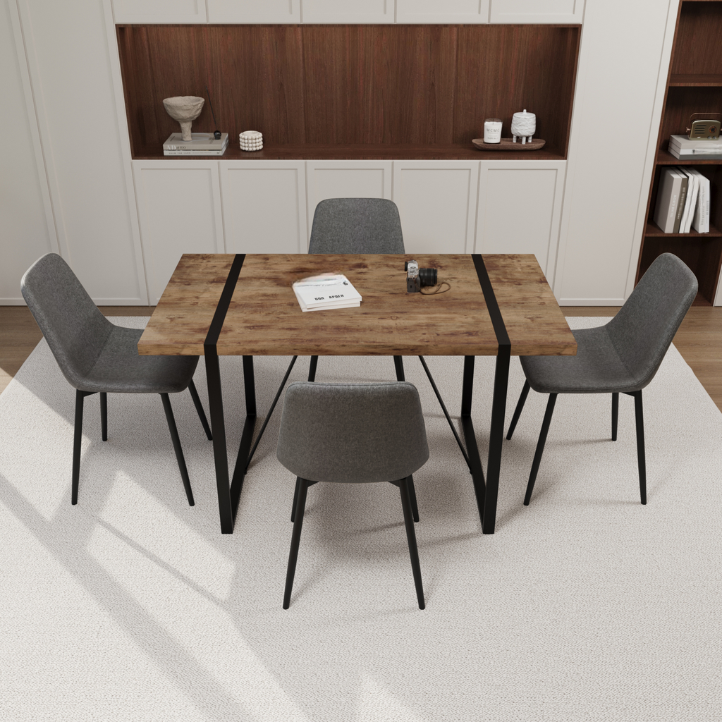Rustic wood dining table with black metal legs and four gray upholstered chairs
