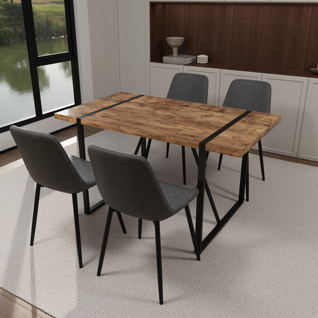 Rustic wood dining table with black metal frame and four grey upholstered chairs