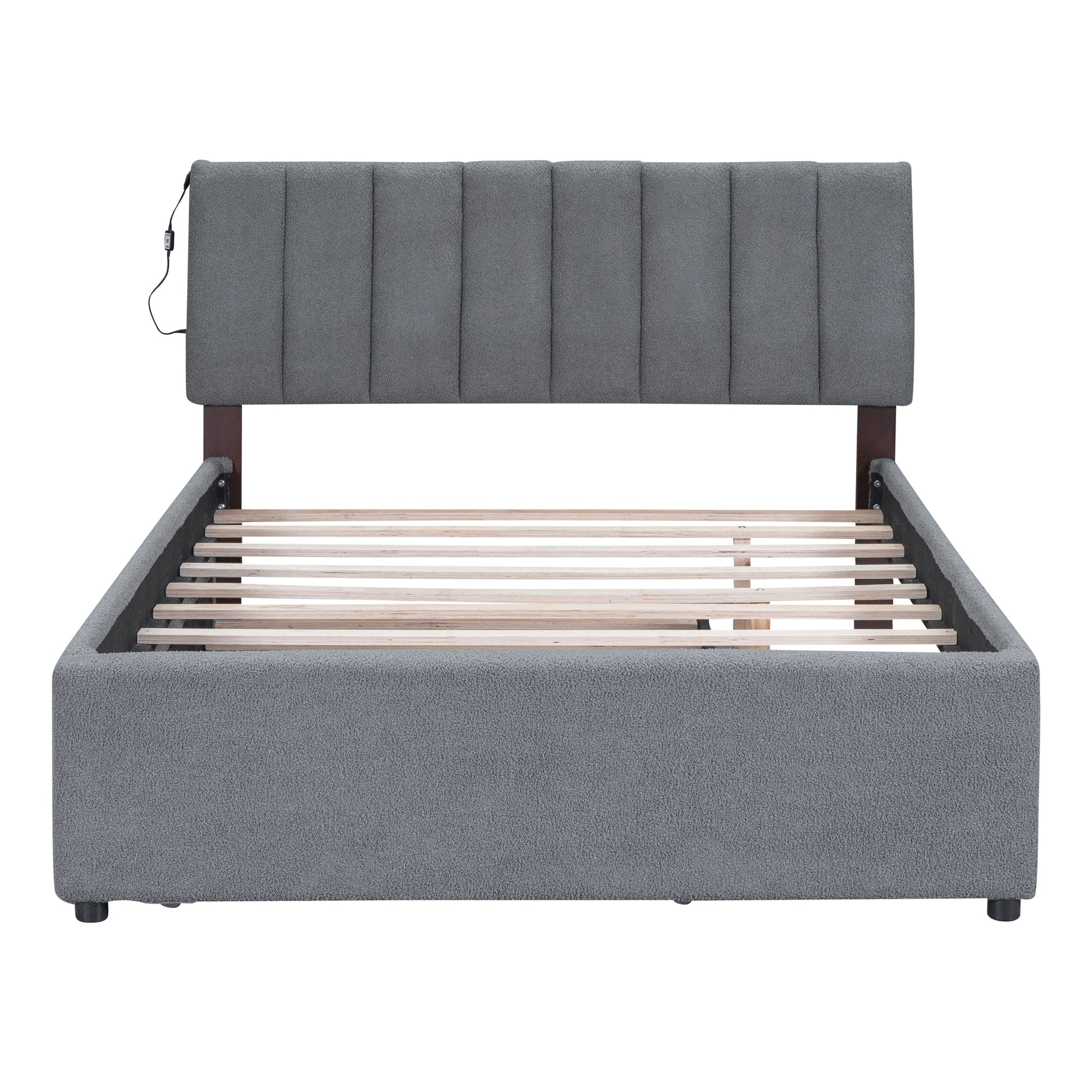 Gray upholstered bed frame with padded headboard and wooden slats
