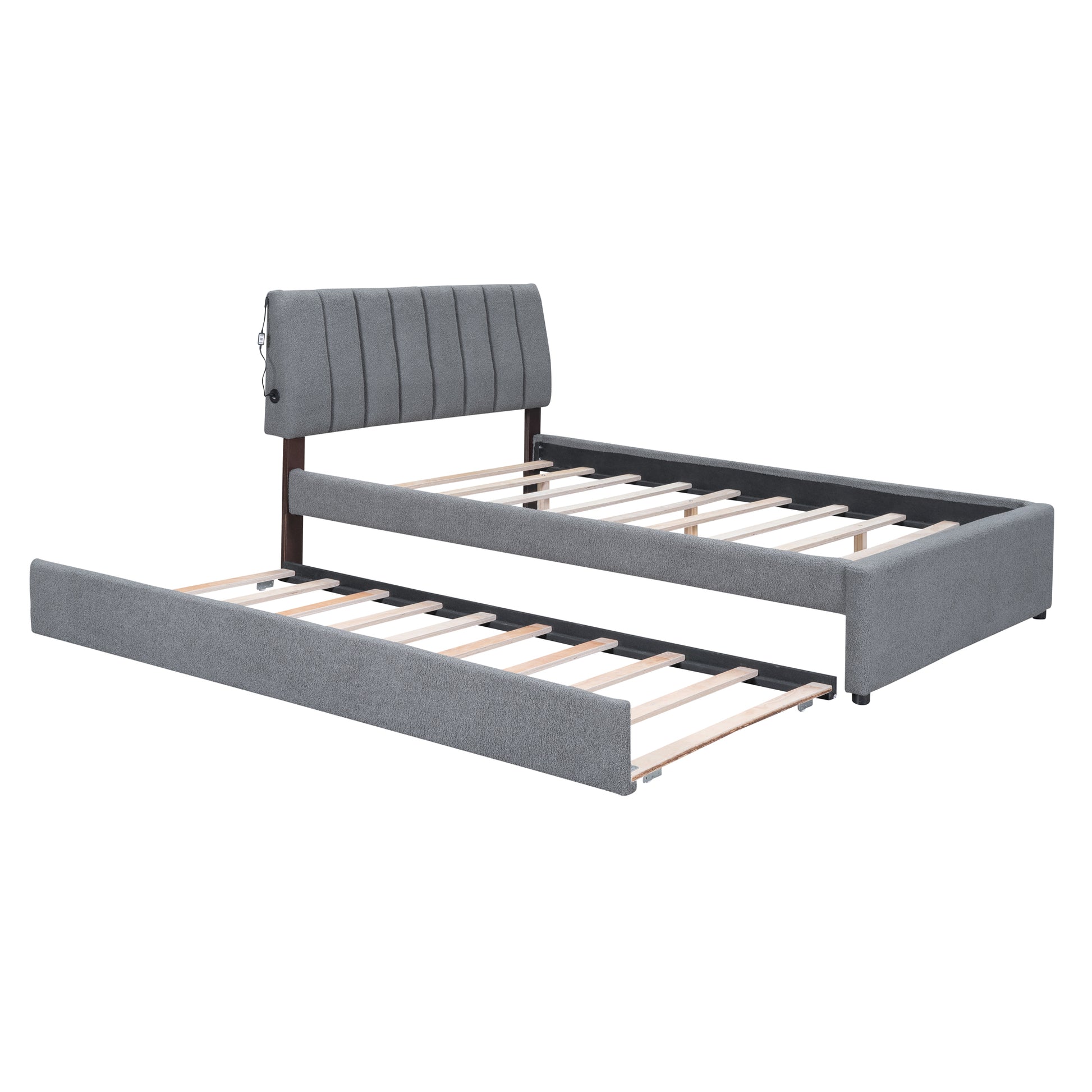 Grey upholstered twin daybed with pullout trundle