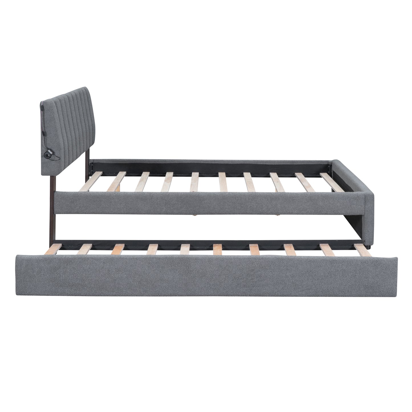 Gray upholstered twin daybed with pullout trundle