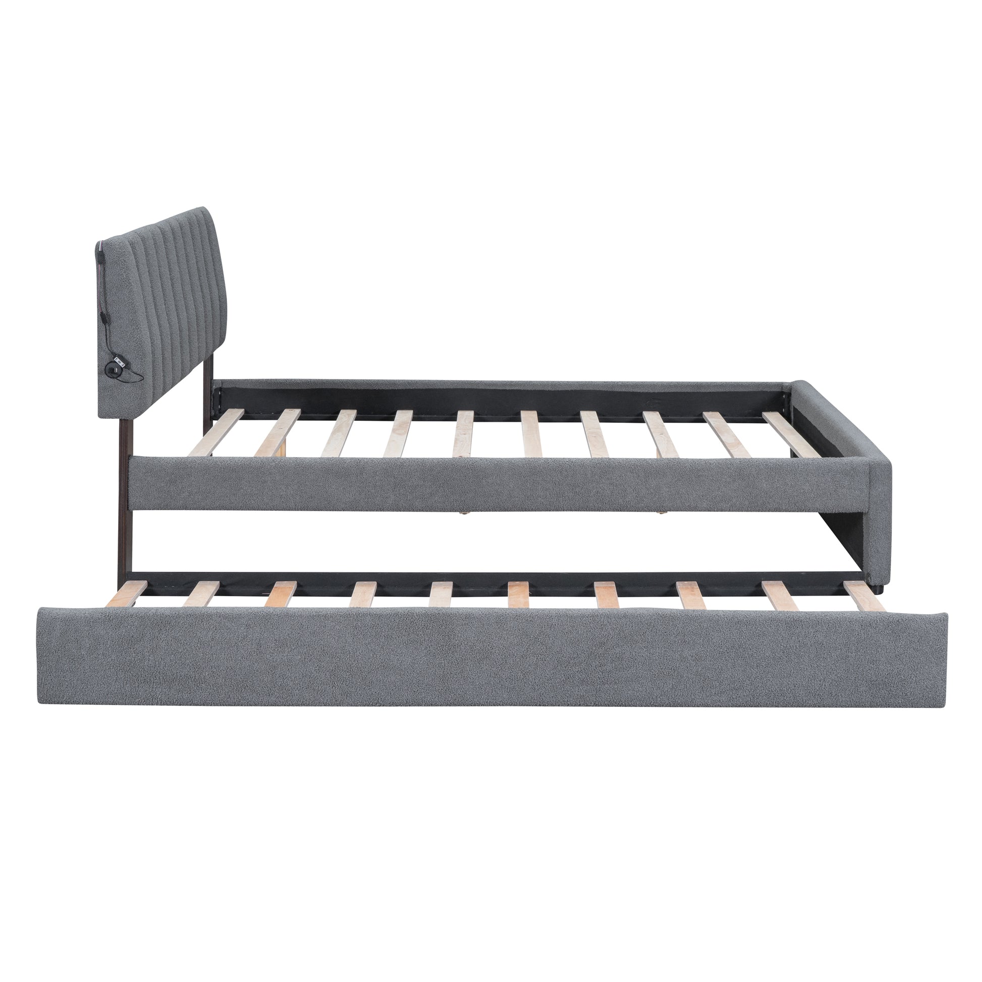 Gray upholstered twin daybed with pullout trundle