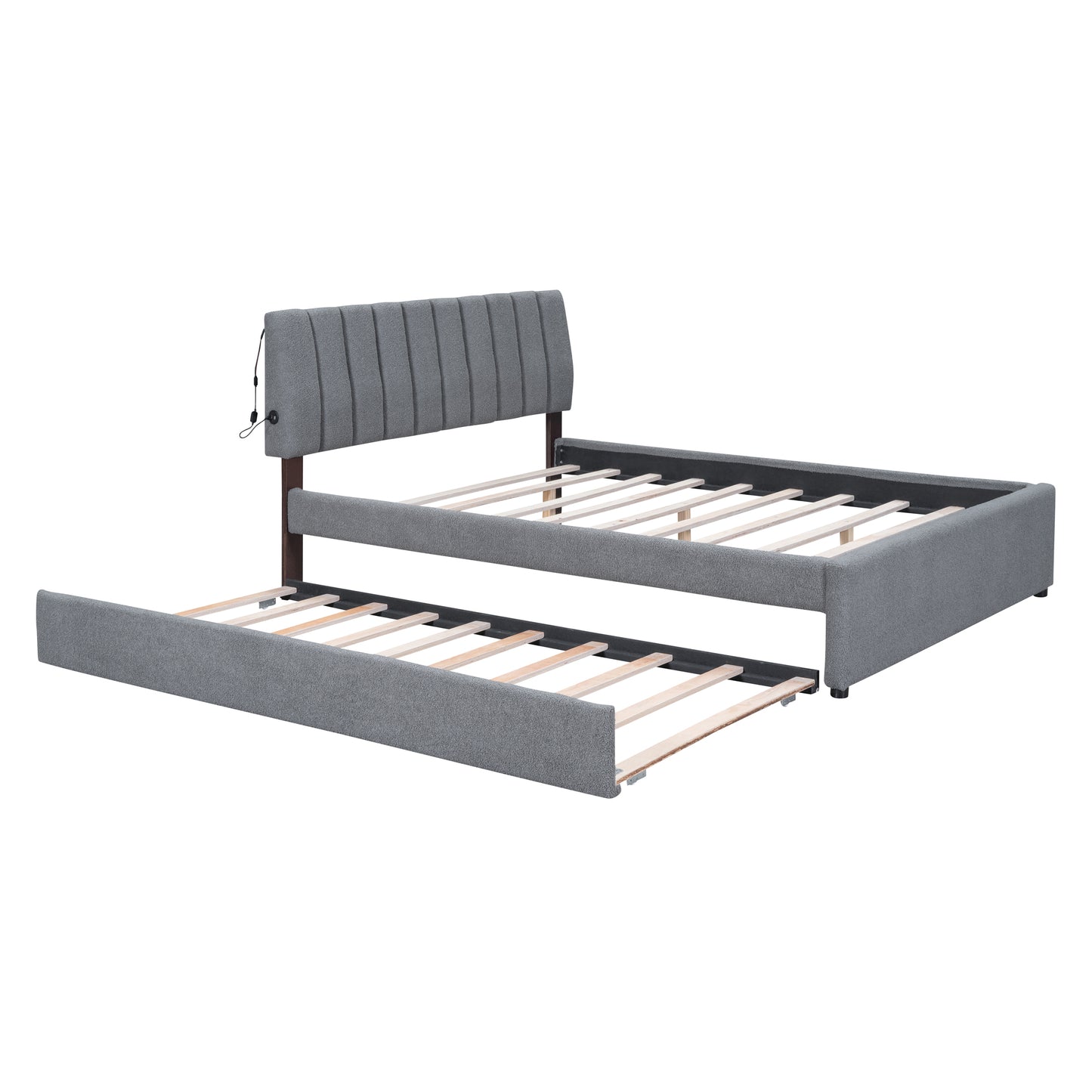 Gray upholstered twin daybed with pullout trundle