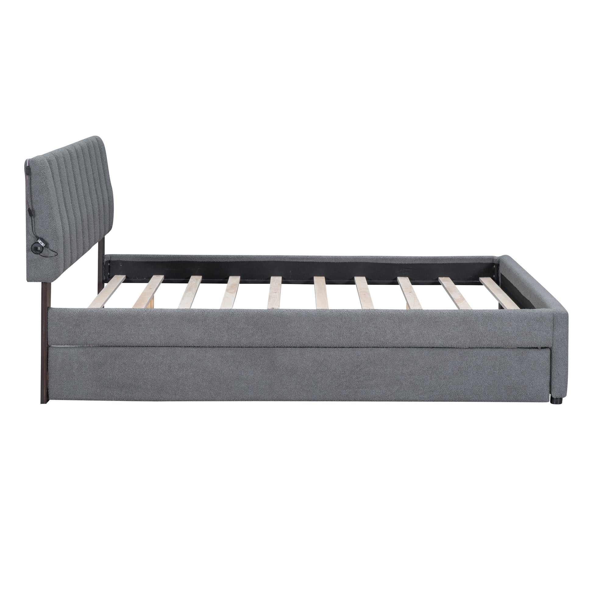 Gray upholstered platform bed frame with tufted headboard