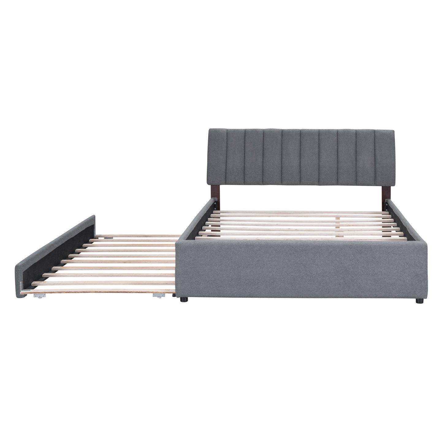 Gray upholstered twin bed with pullout trundle