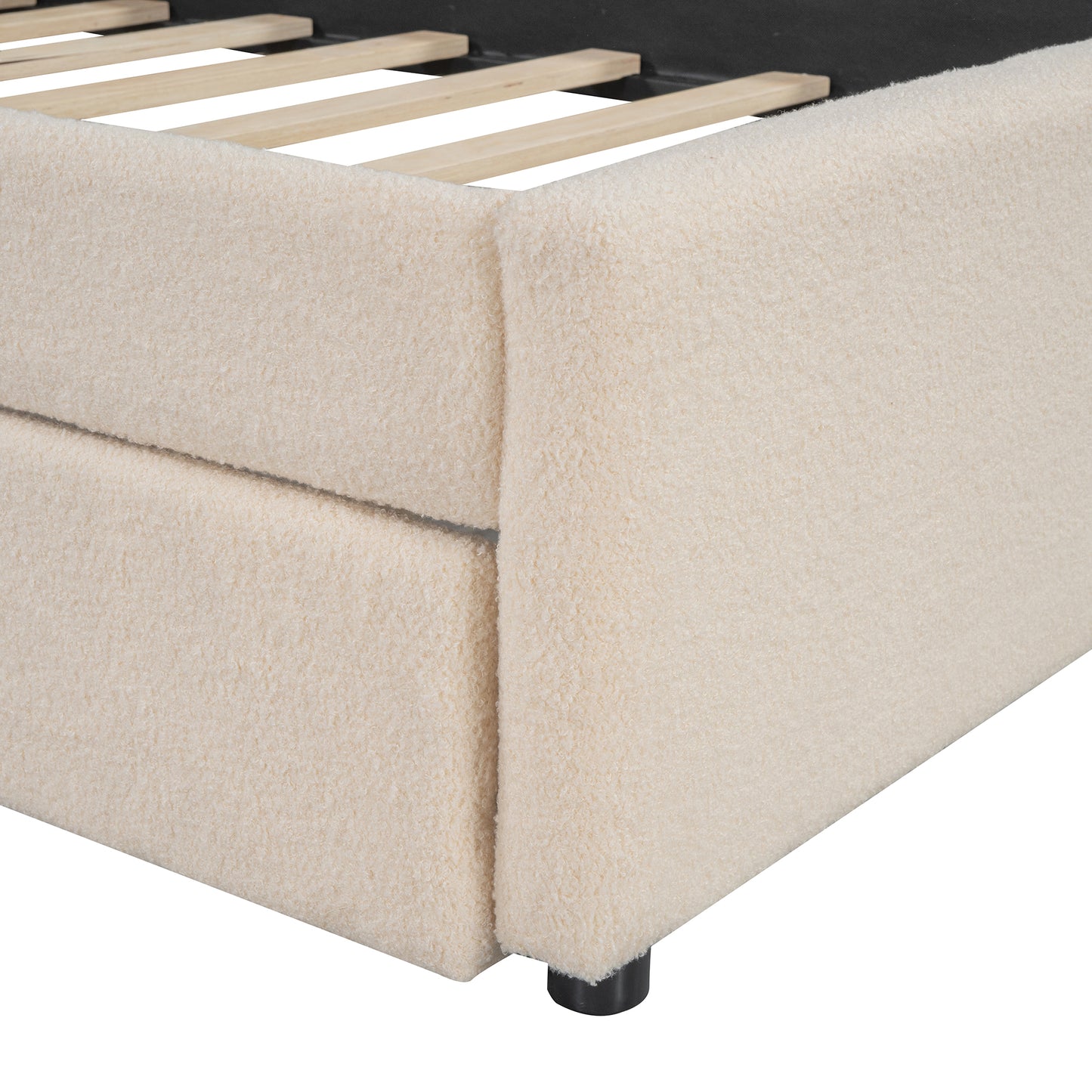 Cream boucle upholstered bed frame with wooden slats visible