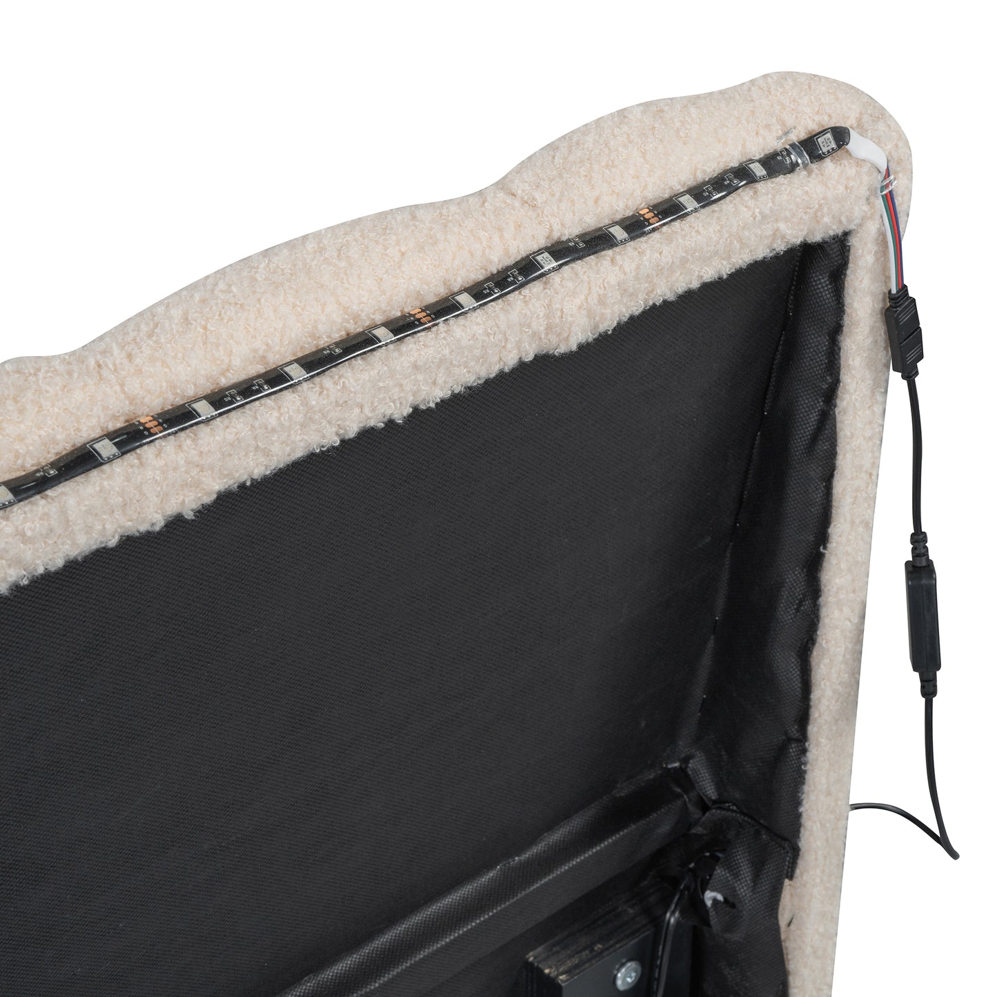 Cream teddy fabric headboard detail with integrated LED strip light