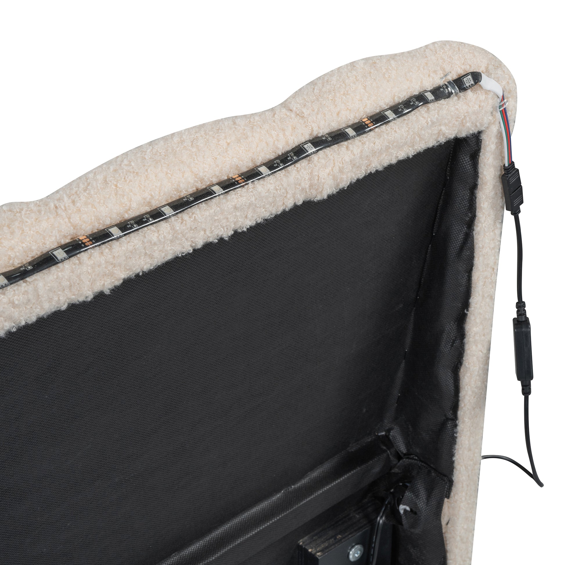 Cream teddy fabric headboard detail with integrated LED strip light