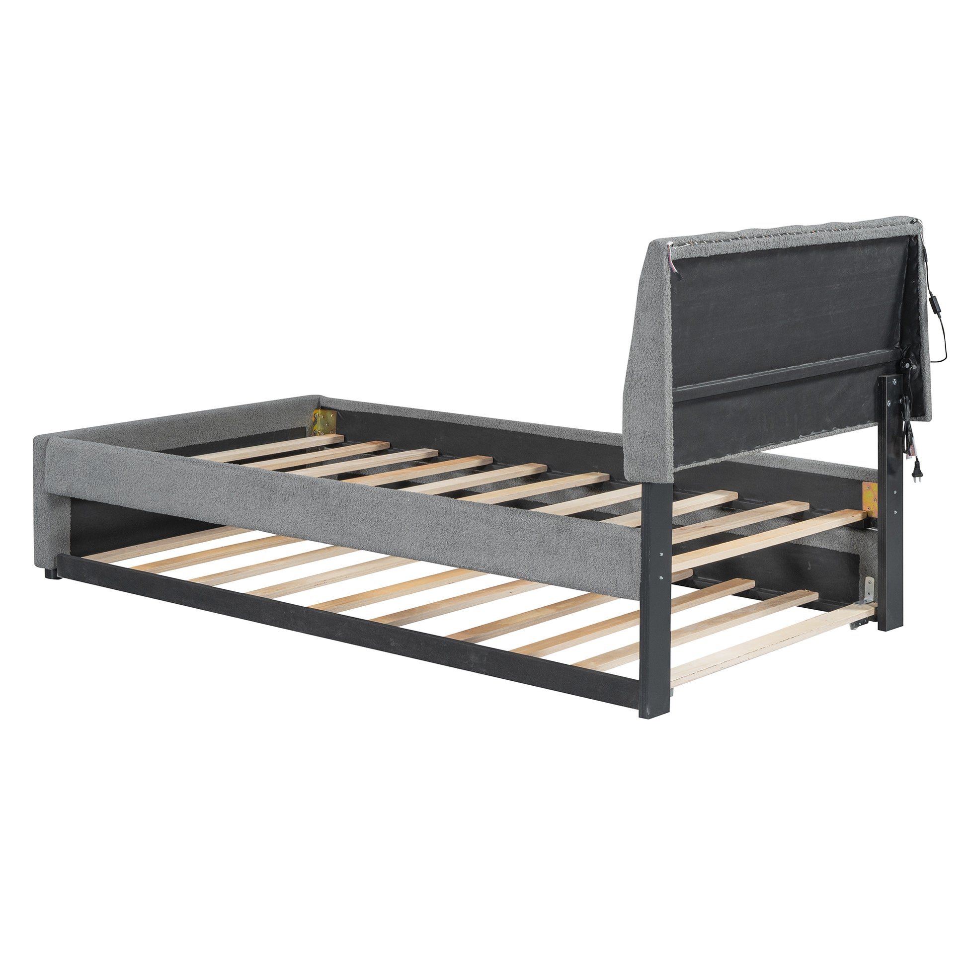 Gray upholstered bed frame with slatted base and adjustable headboard
