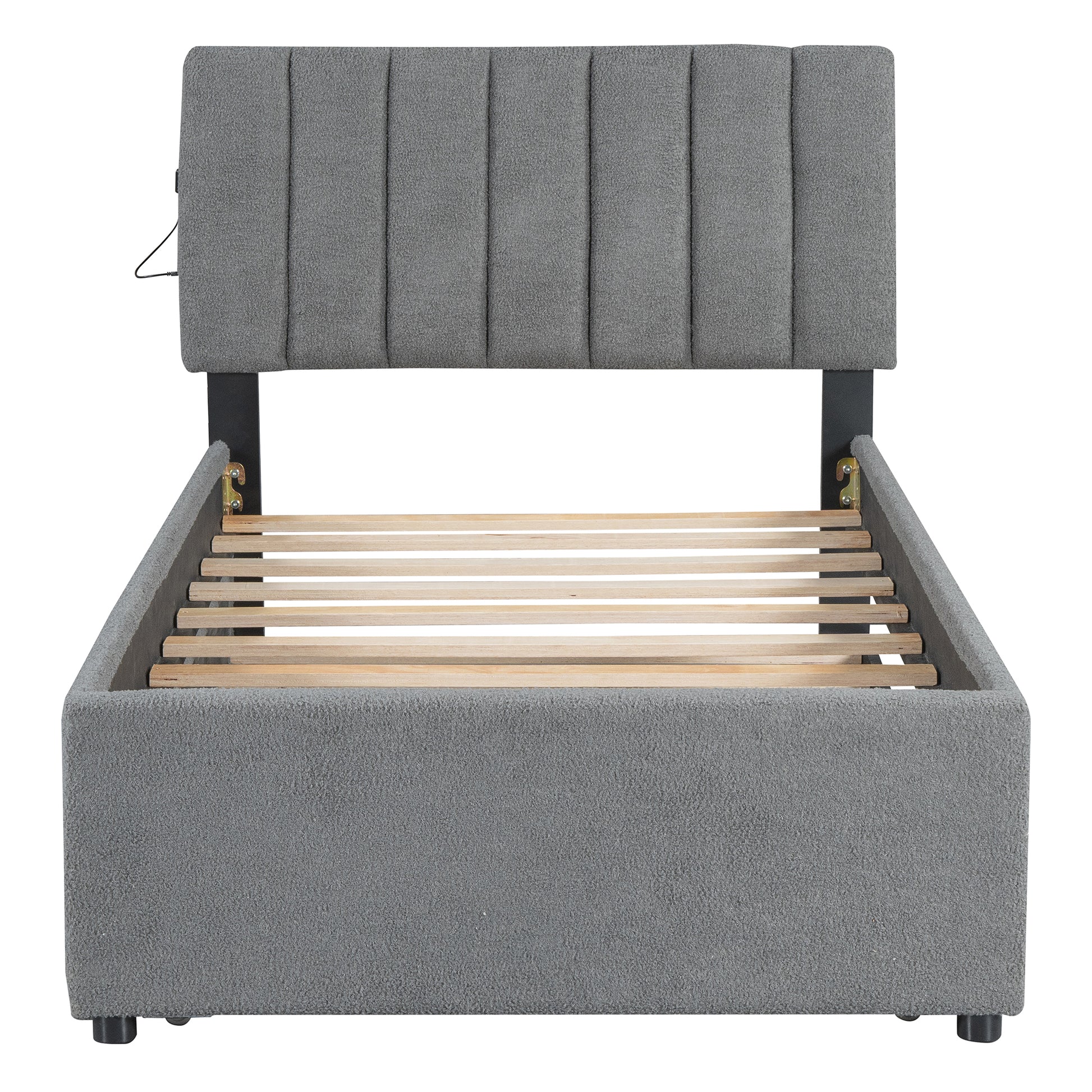 Grey upholstered bed frame with channeltufted headboard and wooden slats