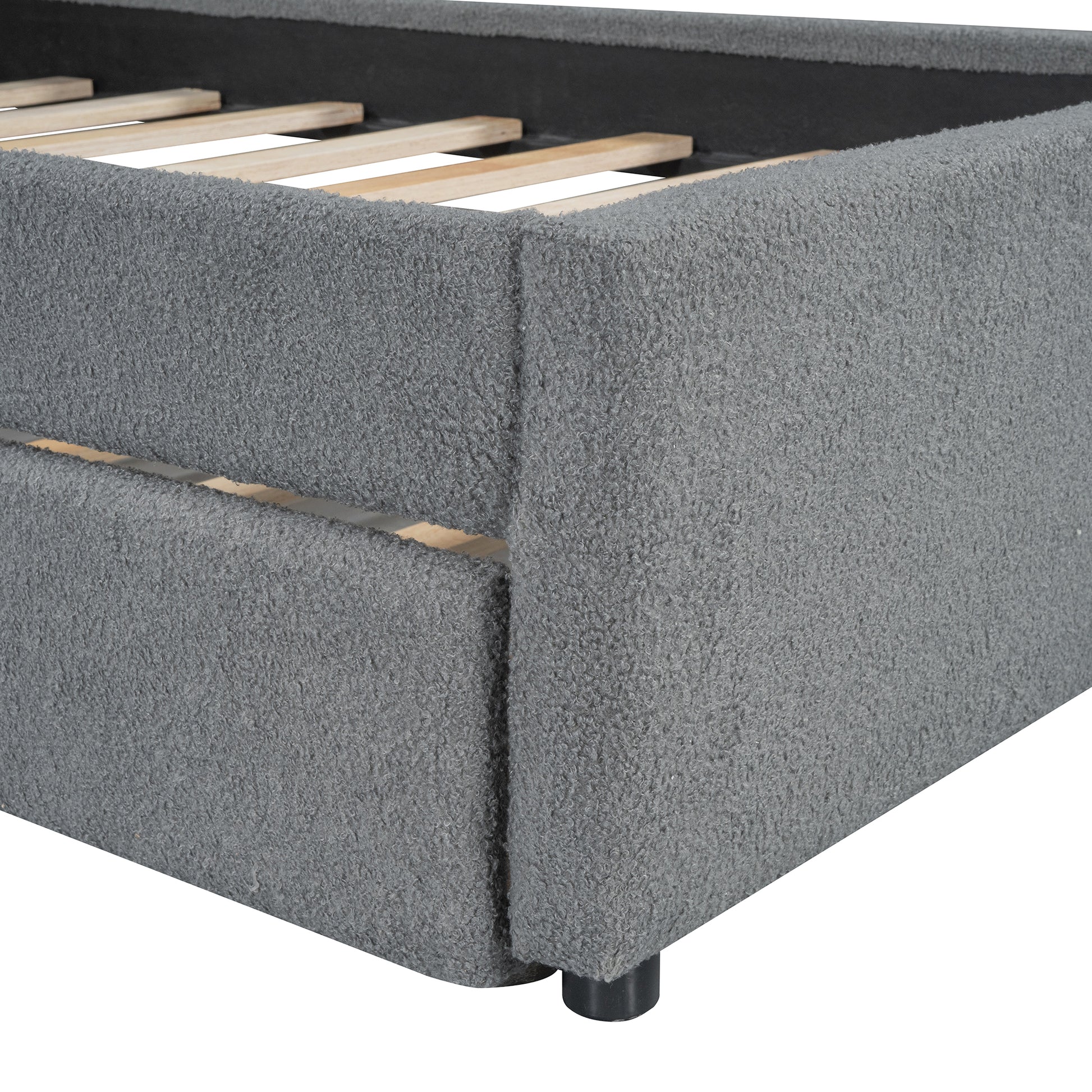 Gray boucle fabric bed frame with wooden slats and black legs