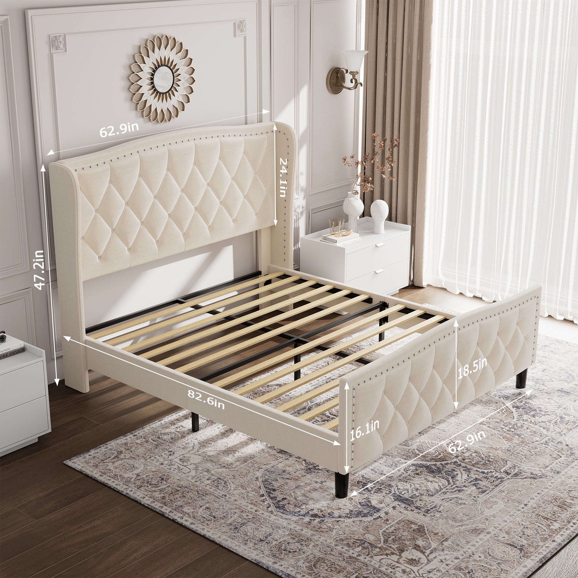 Cream upholstered wingback bed with diamond tufting and silver nailhead trim