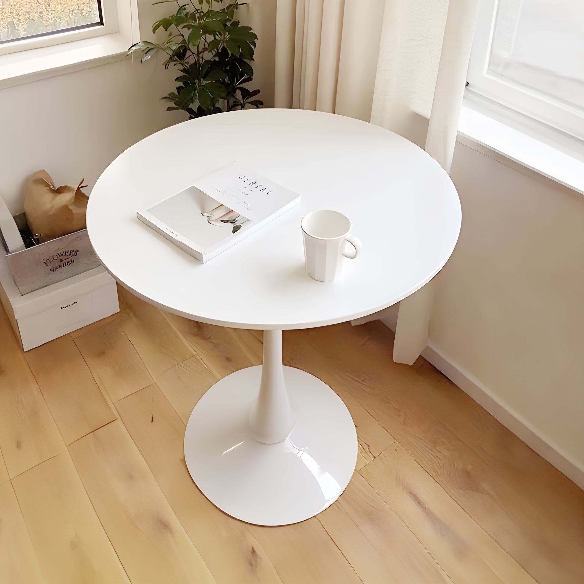 White round pedestal dining table