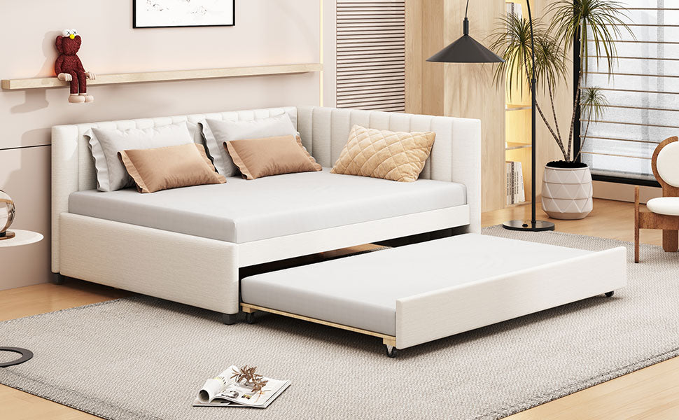 Cream upholstered twin daybed with pullout trundle and accent pillows
