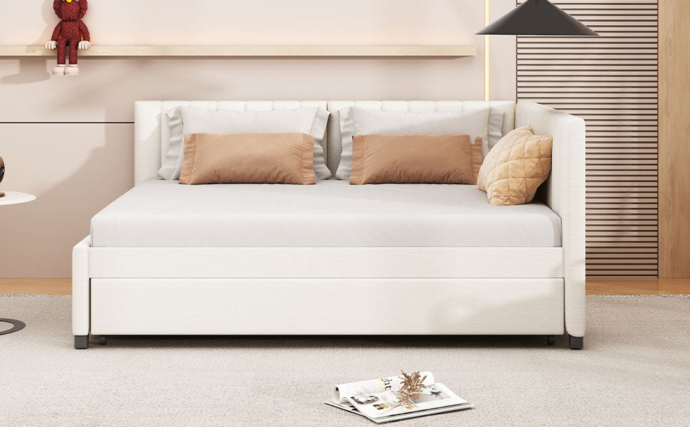 White upholstered daybed with integrated drawer and tan accent pillows