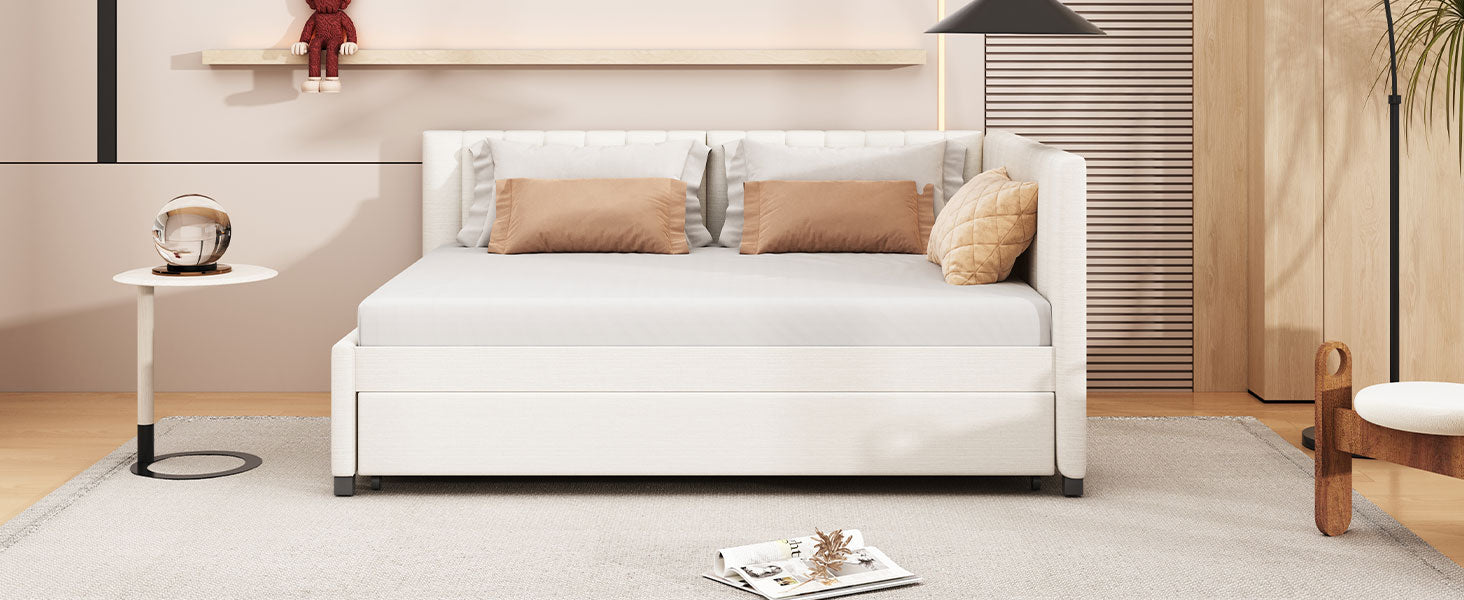 White upholstered daybed with pullout trundle