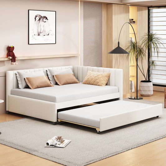 White upholstered daybed with pullout trundle bed