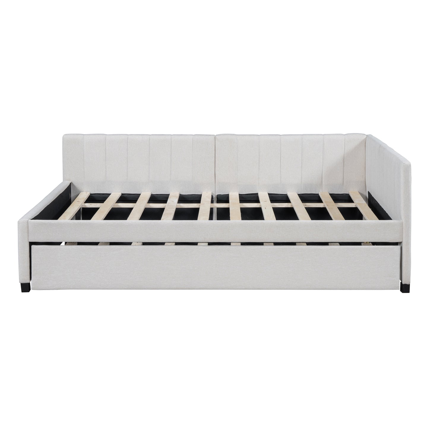 Light beige fabric daybed with tufted back and pullout trundle