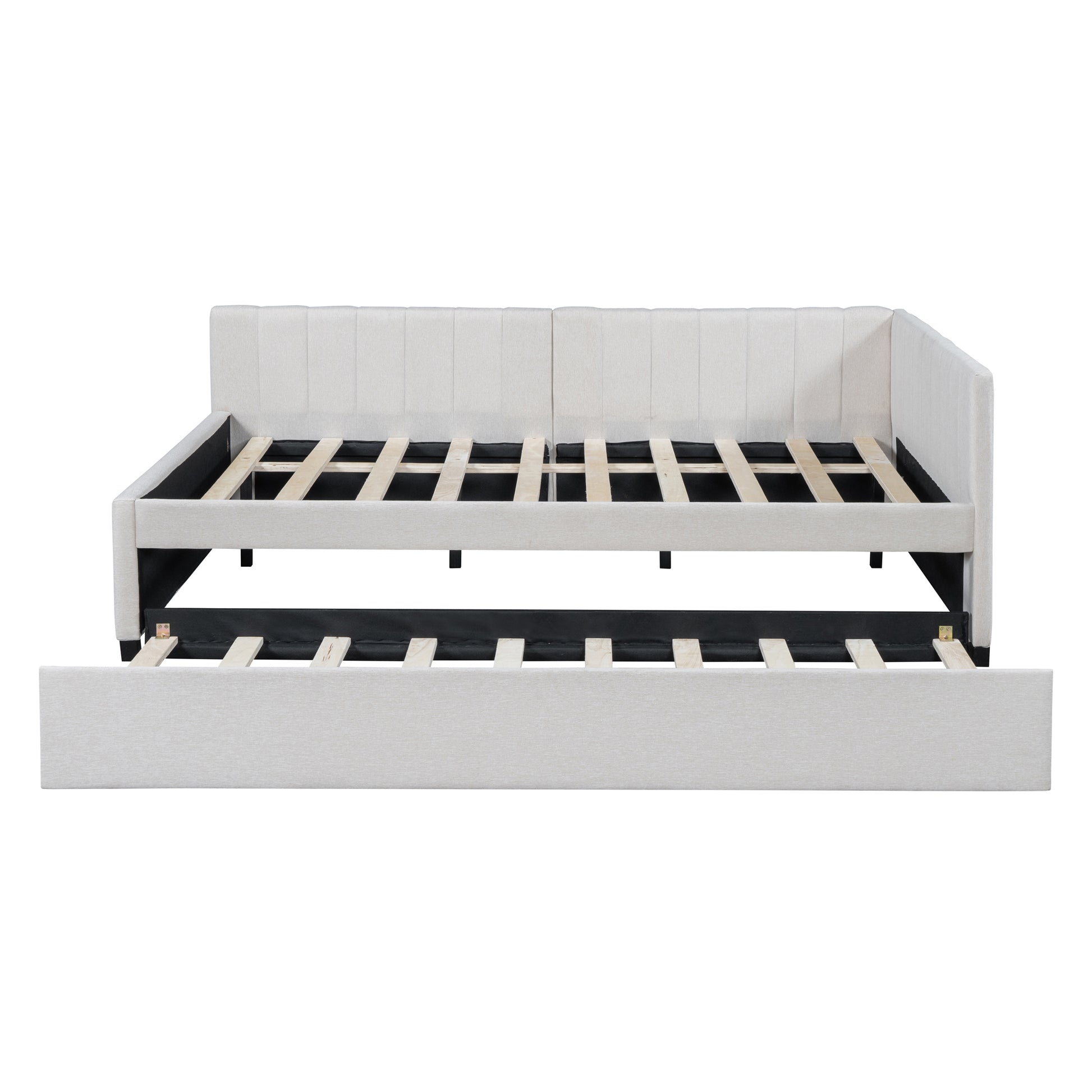 Light grey upholstered daybed with pullout trundle and wooden slats