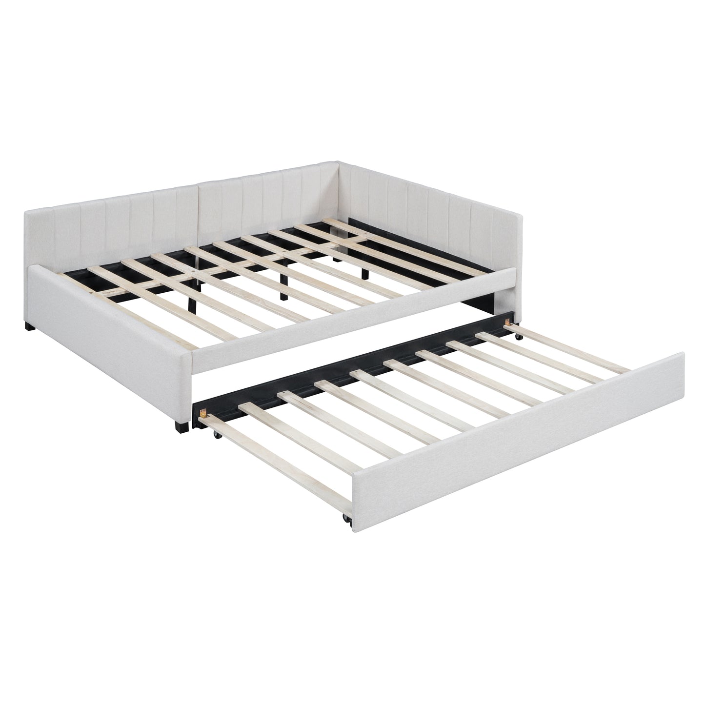 Cream upholstered daybed with a pullout trundle bed on wooden slats