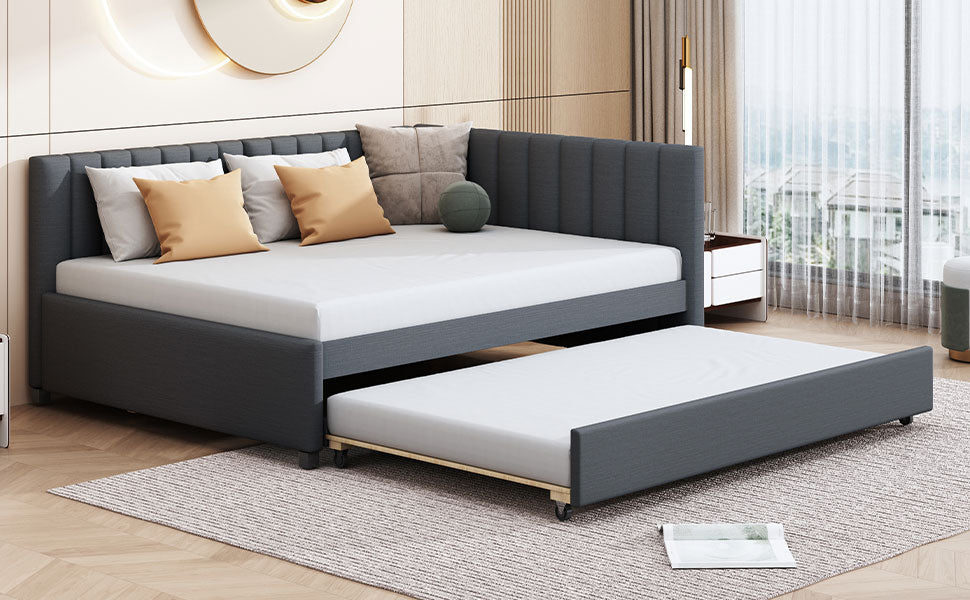 Dark gray upholstered corner daybed with pullout trundle modern design