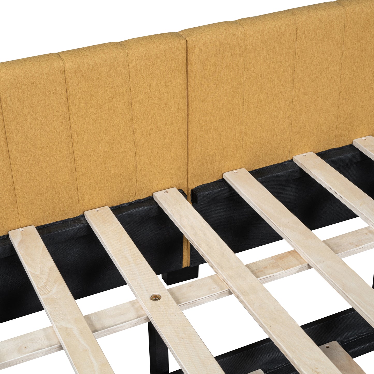 Closeup of mustard yellow upholstered headboard with a wooden slat bed frame