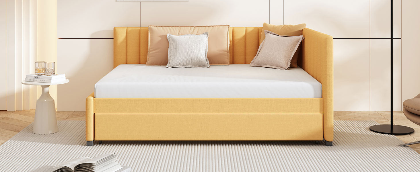 Yellow upholstered daybed with tufted headboard and drawer storage