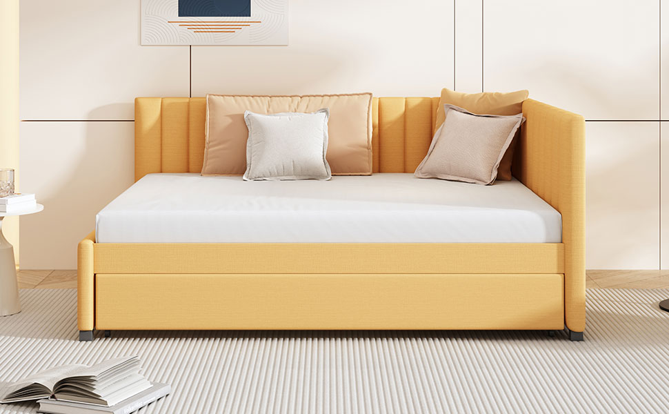 Yellow upholstered daybed with white mattress and accent pillows
