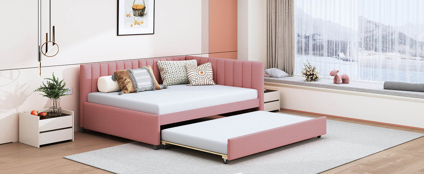 Pink upholstered daybed with pullout trundle