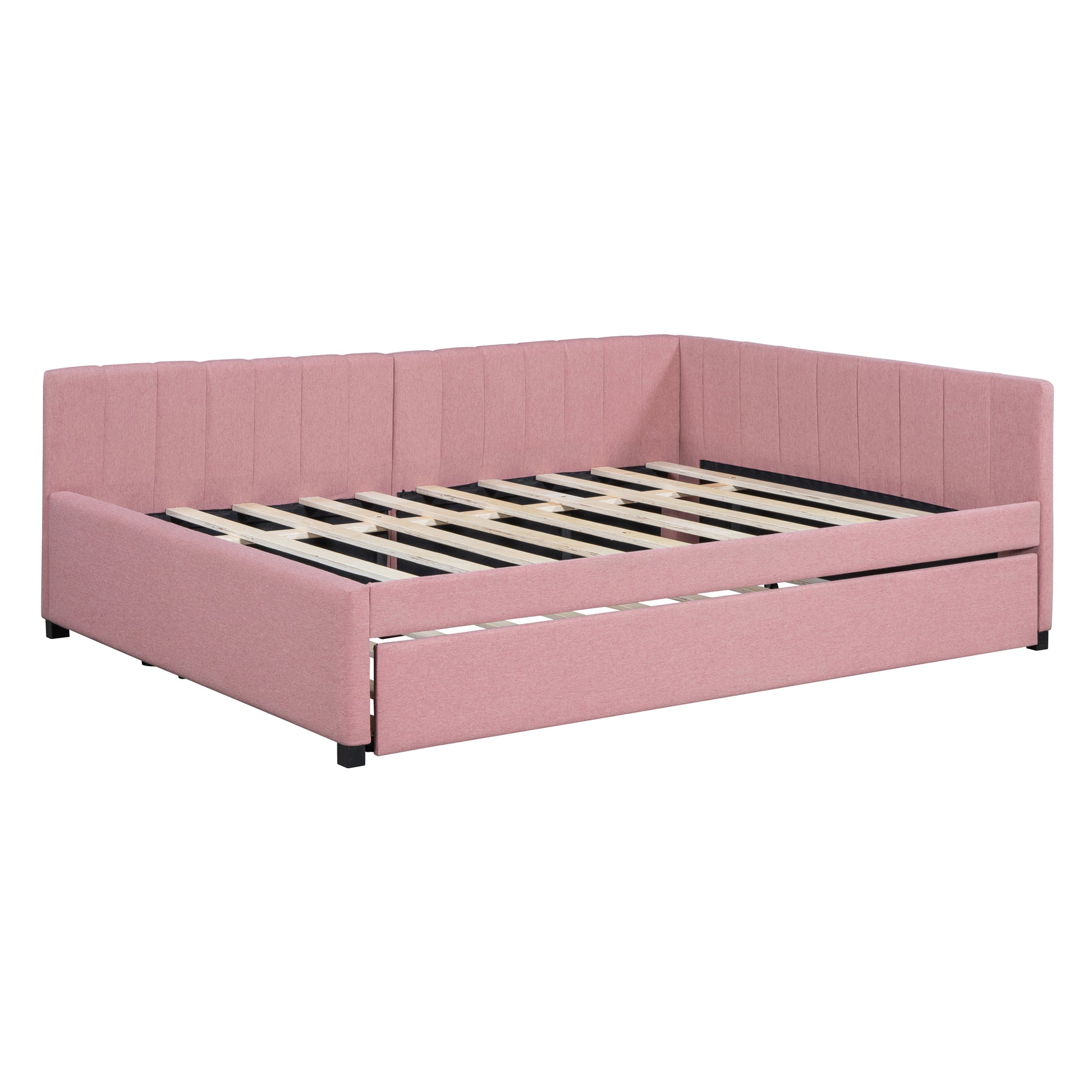 Pink upholstered daybed with pullout trundle and slatted base