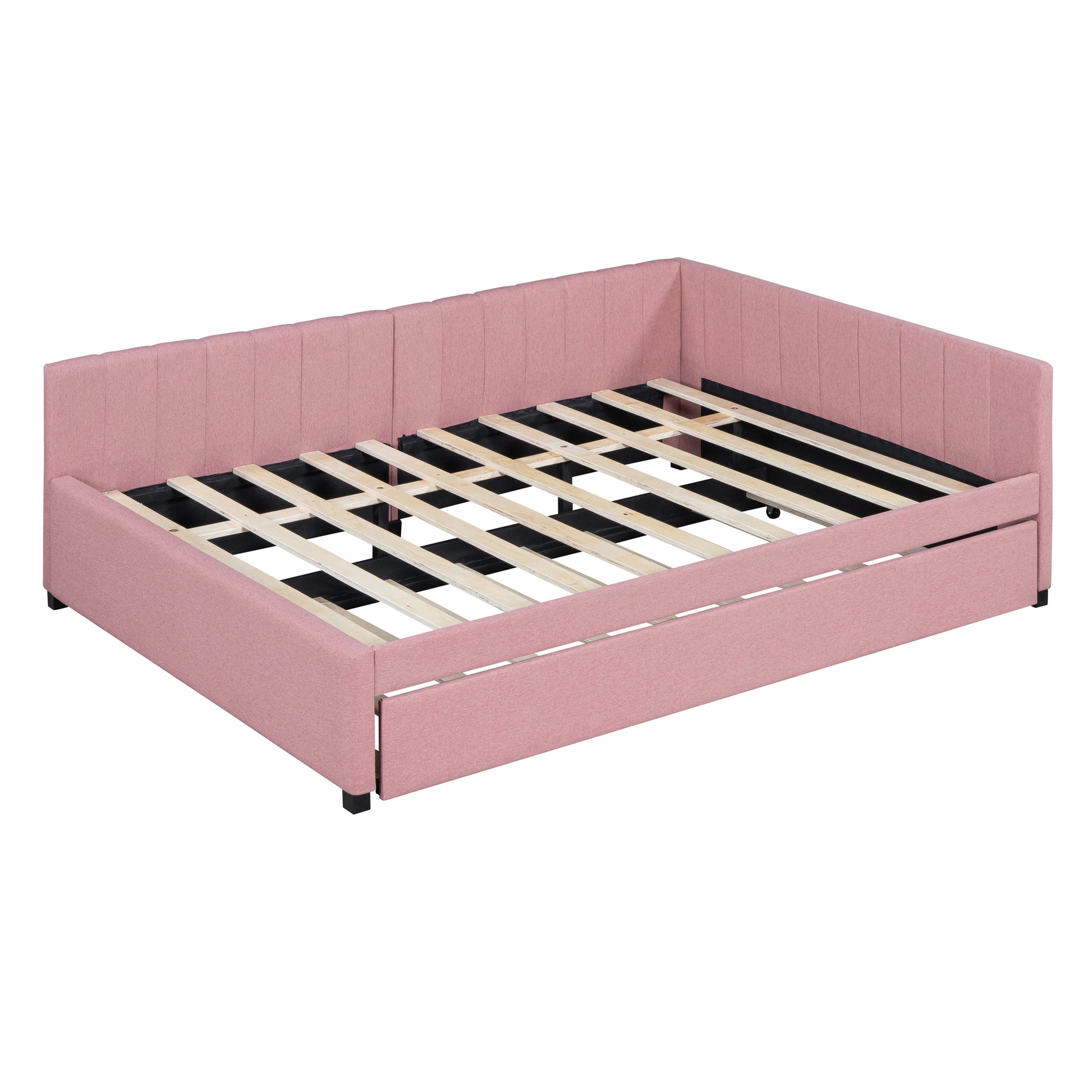 Pink upholstered daybed with pullout trundle