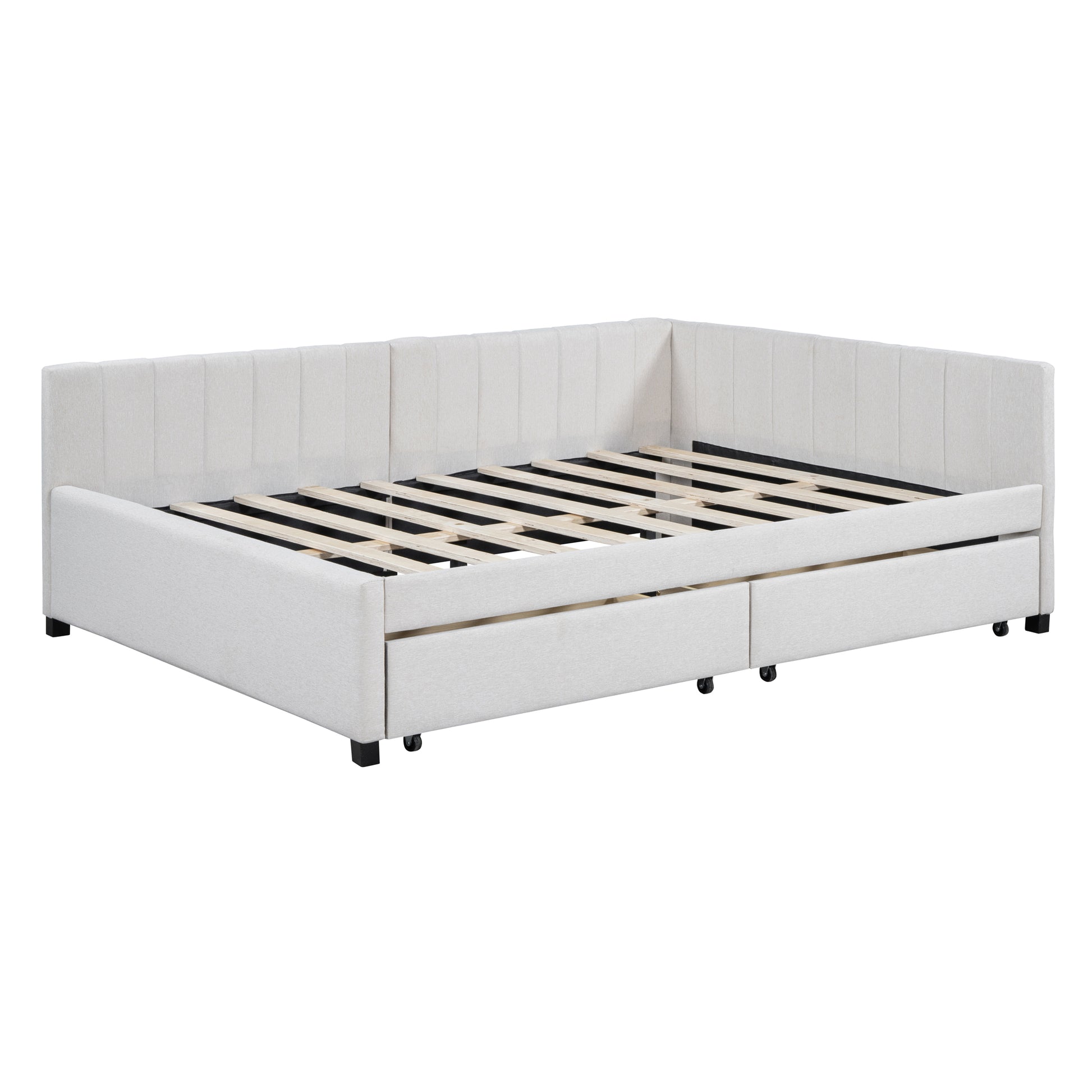 Cream upholstered daybed with vertical channel tufting and two pullout drawers