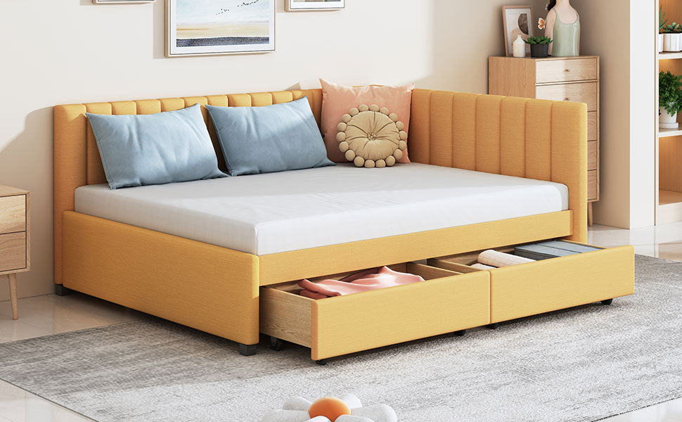 Yellow upholstered daybed with storage drawers and blue pillows