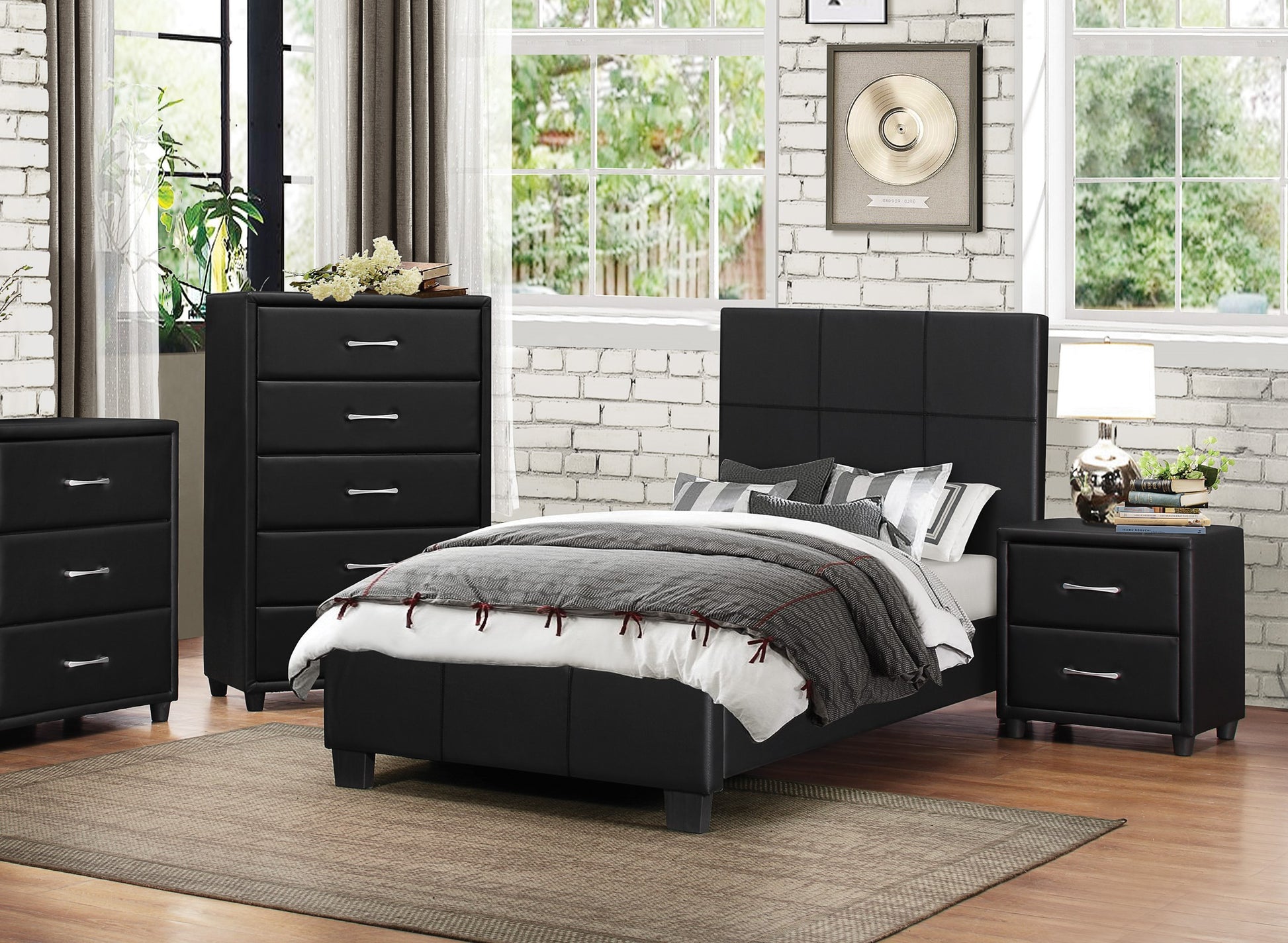 Black faux leather upholstered bed frame with a padded headboard