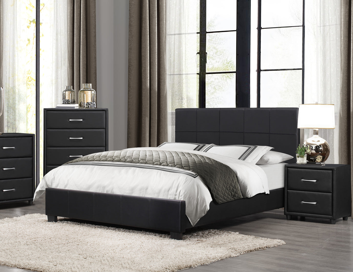 Modern black leather king bed with tufted headboard and matching nightstands