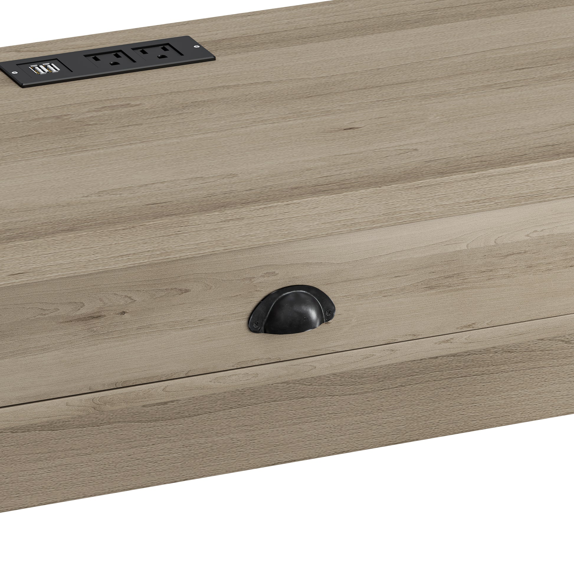 Closeup of integrated power strip with USB ports on a wood grain desk