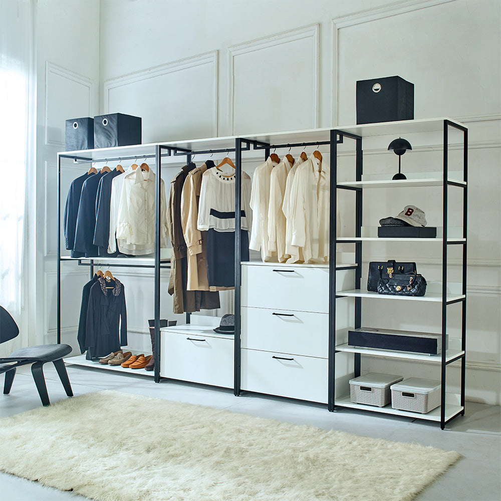 Modern open wardrobe with hanging clothes and storage drawers
