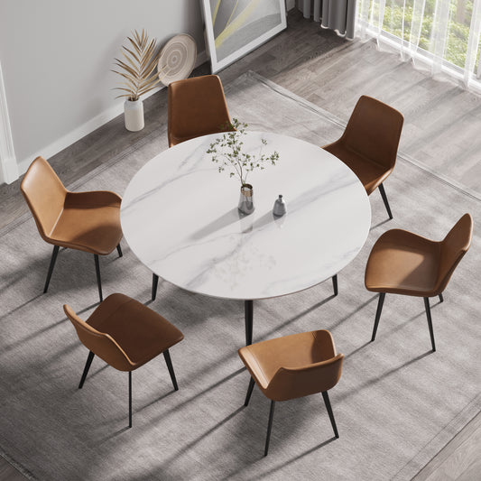 Round white marble dining table with six brown leather chairs