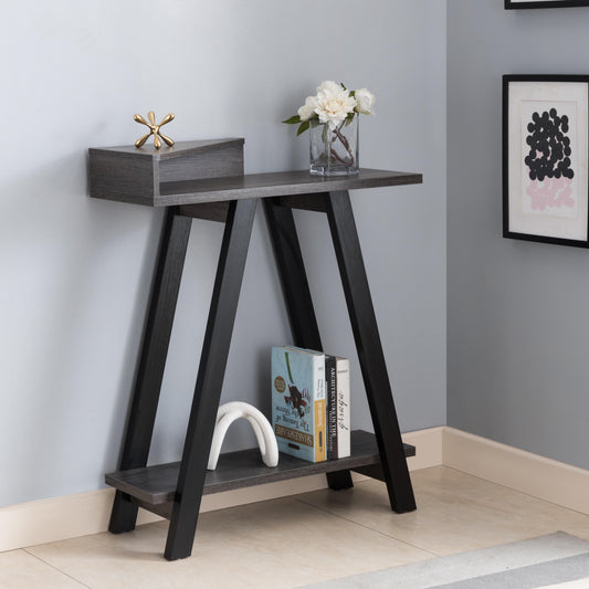 Gray wood Aframe side table with lower shelf holding books and decor