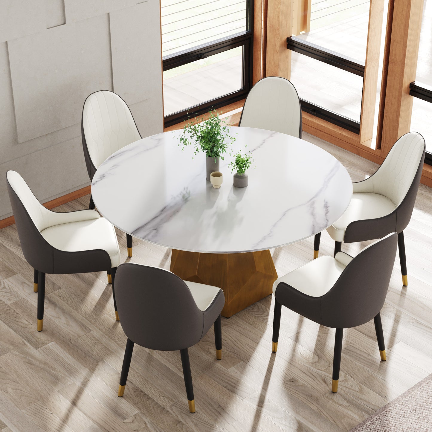 Round marble dining table with modern upholstered chairs