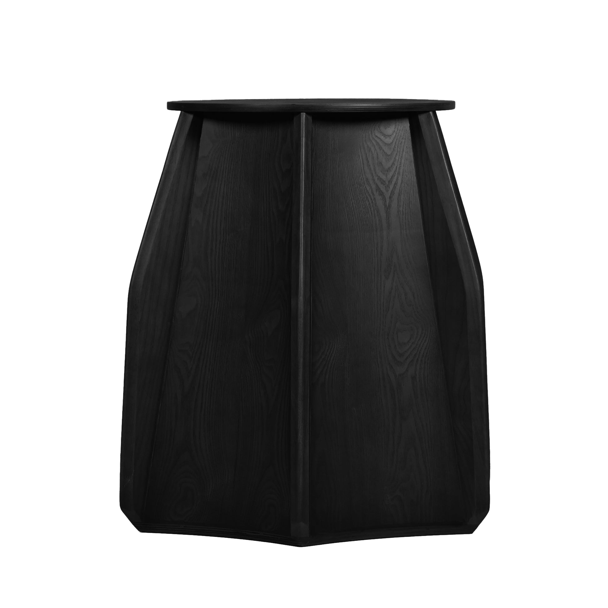 Black wooden side table with faceted design and natural wood grain texture